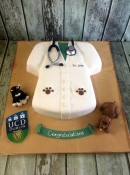 vets coat and animal birthday cake