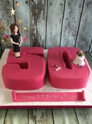number 50 birthday cake with sugar figure