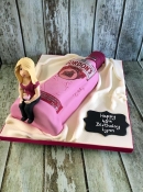 pink gin birthday cake with sugar figure