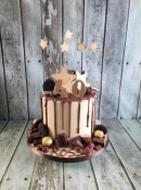 chocolate drip with chocolate decorations birthday cakes