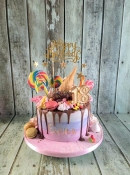 chocolate drip and sweets birthday cake