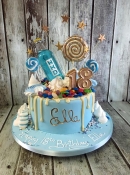 blue wicked drip and sweets birthday cake