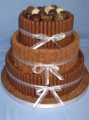 chocolate flakes and finger biscuits wedding cake