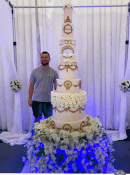 extra-large-wedding-cake-with-gold-sapplique-and-hollow-tier-