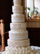 extra-large-wedding-cake-with-lace-and-trellis-hand-piping