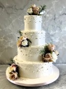 Blush-pink-buttercream-wedding-cake-with-edible-pearls-
