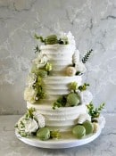 buttercream-wedding-cakde-with-macrons-and-silk-flowers