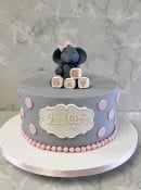 Its-a-girl-baby-shower-cake-with-sogar-elephant-in-gray-and-pink-