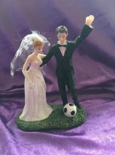 wedding cake topper bride and groom playing football