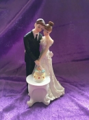 cake topper bride and groom cutting cake