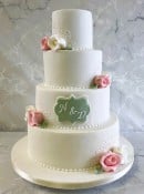 4-tier-sage-green-and-pale-pink-delicate-piping-on-the-corners-with-sugar-roses-and-Initals-