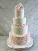 Blush-pink-rosettes-and-ivory-pear-details-