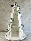 Hexagonal-delicate-hand-painted-blue-wedding-cake-