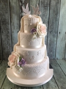 Lace doves vintage pearls wedding cake