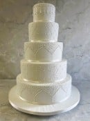 Royal-icing-lace-and-trellis-wedding-cake-with-pearl-droplets