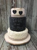 black board and frosting wedding cake