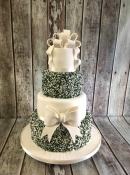green and ivory jimmi sprinkles wedding cake