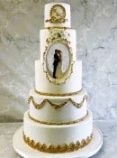 oval-hollow-wedding-cake-with-gold-handpainting-