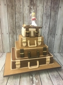 suit case  with boxing figures wedding cake