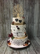 tree style wedding cake with autum leaves