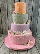 vintage-wedding-cake-with-dog-eating-into-ther-cake-