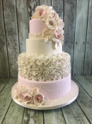 vintage wedding cake with fuffles 4 tier