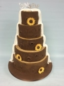 wedding cake split tree trunk with sunflowers