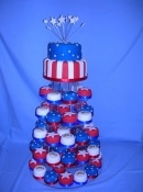 stars and stripes wedding cakes and mini cakes on a stand