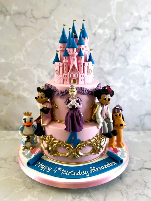 Disney inspired birthday cake with all sugar figures