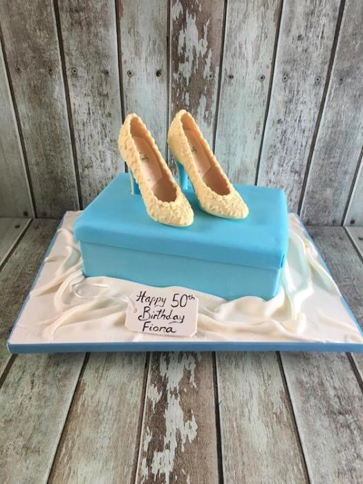 shoe box and a pair of chocolate shoes birthday cak