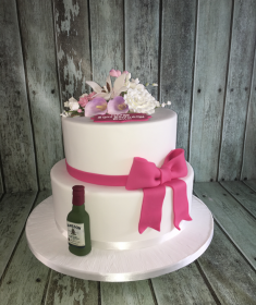 2 tier birthday cake with sugar bow