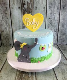 pretty blue cake with elephant