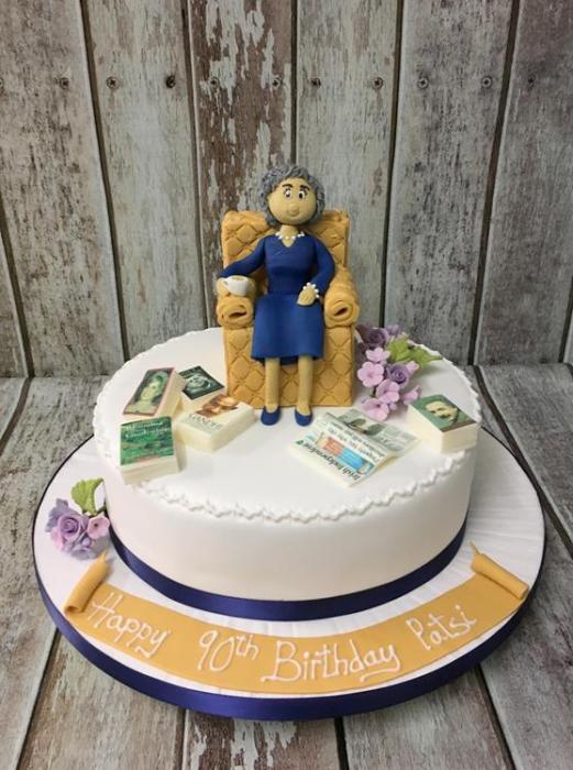 lady sitting on a chair birthday cake