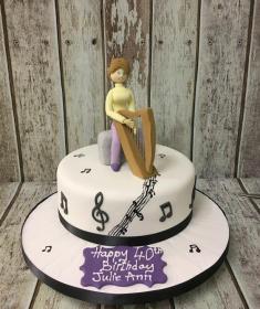 woman with a harp birthday cake