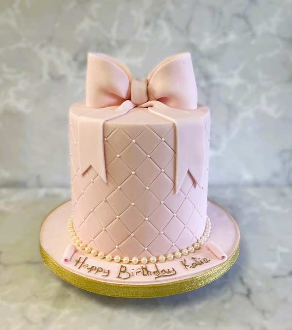 Pink bow birthday cake