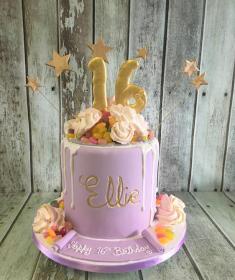 sweet 16 drip birthday cake with sweets andmerangues