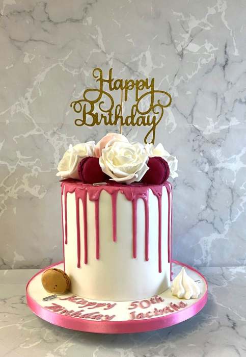 Pink-drip-birthday-cake-with-silkl-flowers-