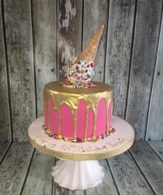 icecream gold drip birthday cake with pink icing