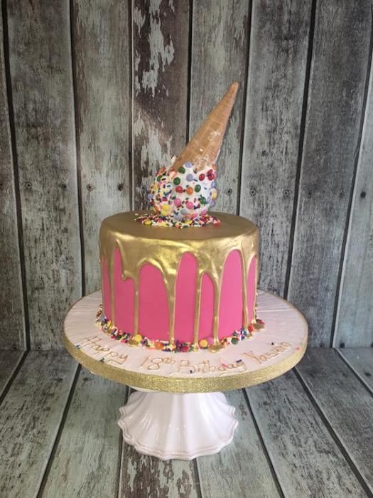 icecream gold drip birthday cake with pink icing