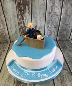 man in a boat & sheep birthday cake