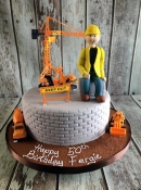 Building construction man birthday cake