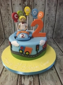 boy in car birthday cake