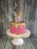 icecream gold drip birthday cake with pink icing