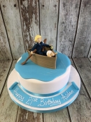 man in a boat & sheep birthday cake