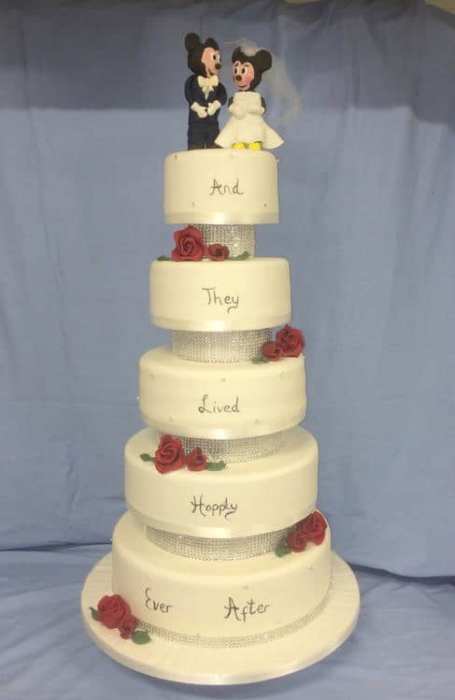 Extra large wedding cake Disney Mickey and mini cake topper sugar Roses on the corner and they lived happily ever after