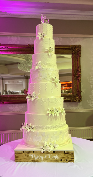 extyra-large-wedding-cake-withb-sugar-lillies-and-laceand-pears-