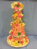 Extra large wedding cake it must be love all made of chocolate decorations for a bright and vibrant wedding