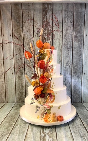 5-tier-buttercream-wedding-cake-with-dried-and-silk-flowers-