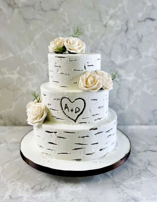 Buttercream  frosting tree bark layered wedding cake