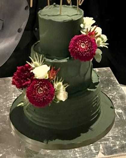 Dark Green  multi textured buttercream wedding cake with silk flowers